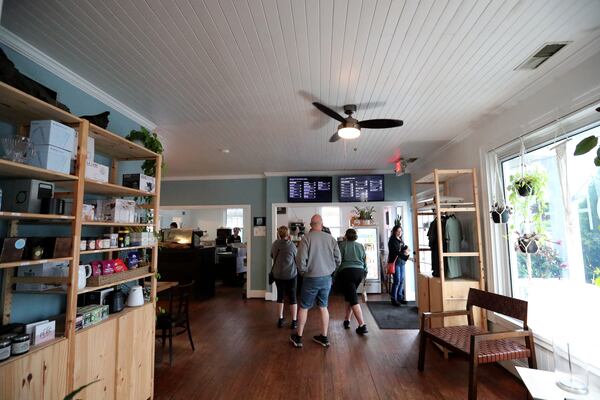 Customers check out the menu at Way Station Coffee Co. In Richmond Hill.