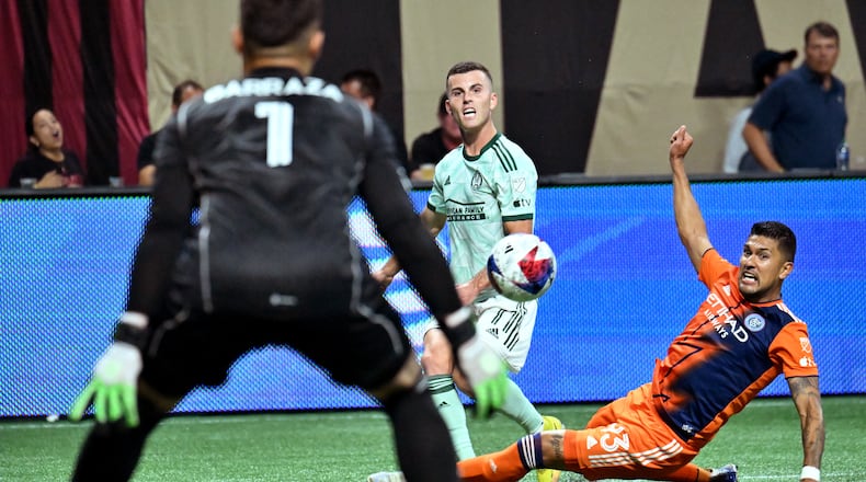Atlanta United's defender Brooks Lennon (11) takes a shot during the second half in a MLS soccer match at Mercedes-Benz Stadium, Wednesday, June 21, 2023, in Atlanta. Atlanta United ties New York City FC 2 - 2.(Hyosub Shin / Hyosub.Shin@ajc.com)
