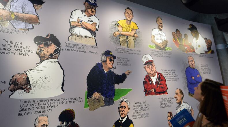 Atlanta Journal-Constitution cartoonist Mike Lukovich drew famous coaches with a quote by them. KENT D. JOHNSON / KDJOHNSON@AJC.COM