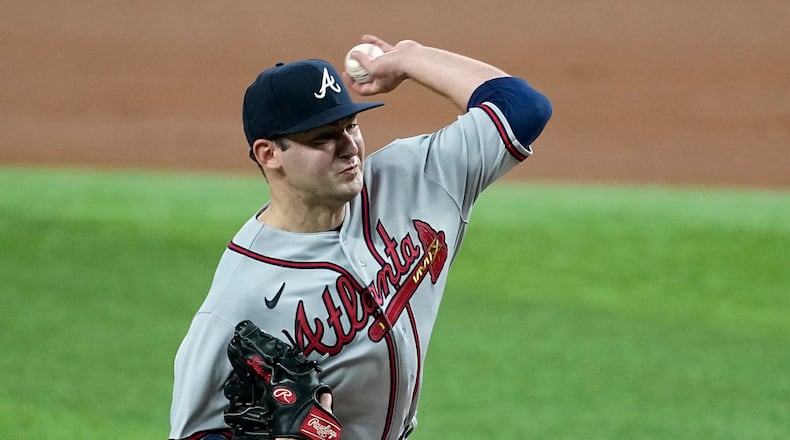 Braves starting pitcher Jared Shuster throws to the Texas Rangers in the first inning of a baseball game, Tuesday, May 16, 2023, in Arlington, Texas. (AP Photo/Tony Gutierrez)