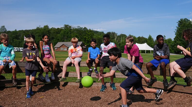 Dylan Aristy Mota, 12, of New York City, who has lupus, plays a game of Gaga Ball with fellow campers at the Frost Valley YMCA sleepaway camp in Claryville, N.Y., Wednesday, July 30, 2025. The camp partnered with Children's Hospital at Montefiore so kids with autoimmune diseases could attend for the first time. (AP Photo/Matt Rourke)