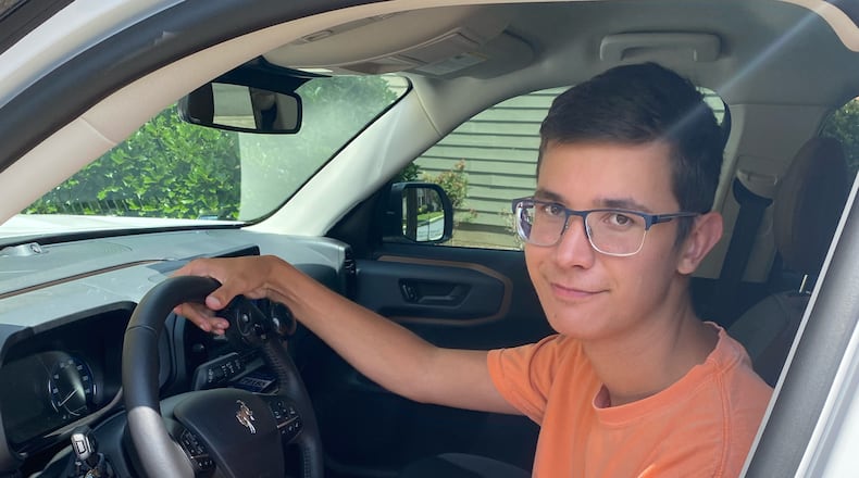 Matthew Caymol survived two open heart surgeries, a horrific car accident, and leads a life of positivity and faith. Courtesy of Angie Caymol