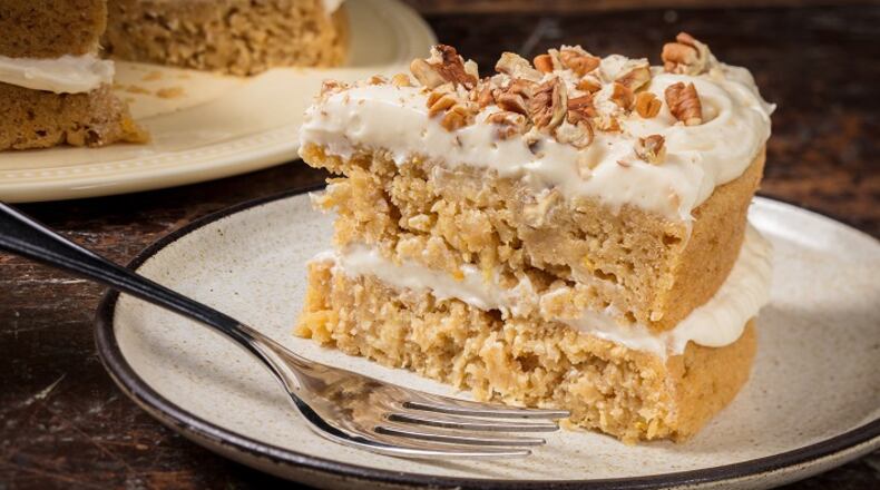 Shredded parsnips and apples keep the cake moist and tender. (Zbigniew Bzdak/Chicago Tribune/TNS)