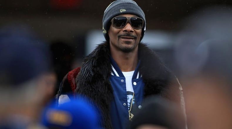Snoop Dogg paid a surprise visit to a youth football team in San Antonio.