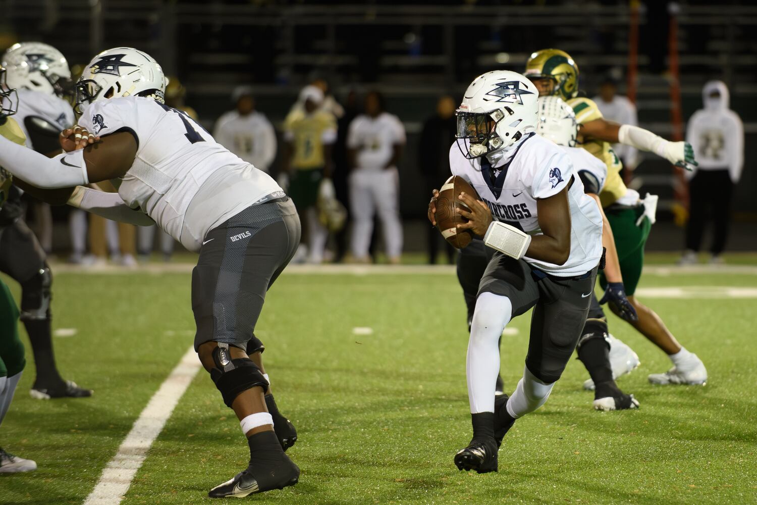 Norcross quarterback Dillon Mohammed looks to make a pass. (Jamie Spaar for the Atlanta Journal Constitution)