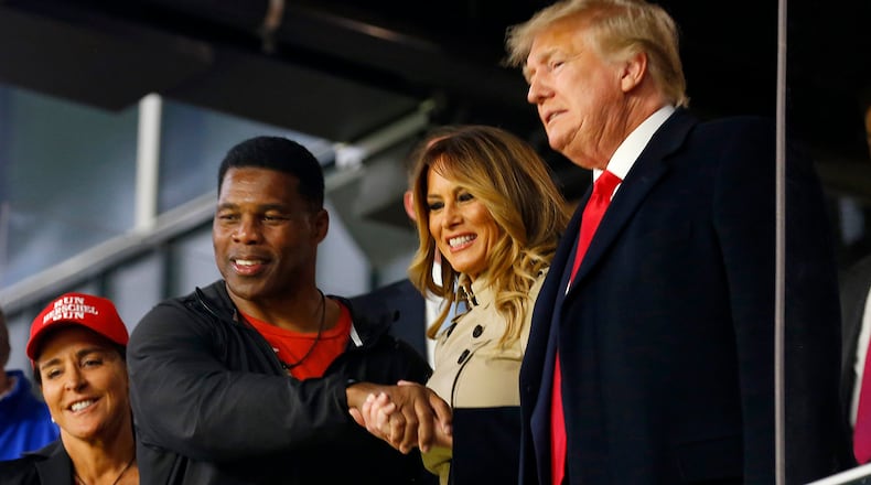 Former President Donald Trump will hold a rally Saturday in Commerce for a slate of Republican candidates he has endorsed, including U.S. Senate hopeful Herschel Walker, left. (Michael Zarrilli/Getty Images/TNS)