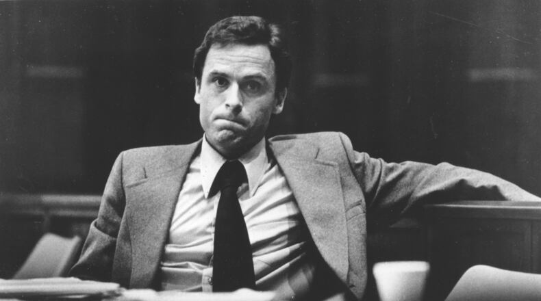 FILE - Accused murderer Ted Bundy attends the second day of jury selection in his murder trial, June 27, 1979, in Miami, Fla. (AP Photo,File)