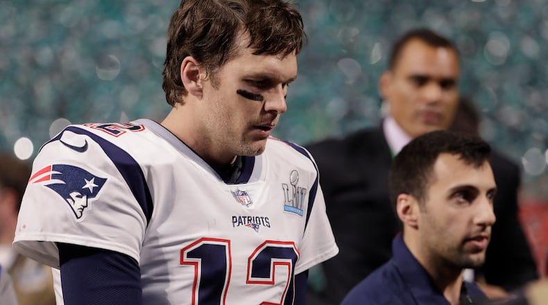 New England Patriots' Tom Brady walks off the field after the NFL Super Bowl 52 football game against the Philadelphia Eagles Sunday, Feb. 4, 2018, in Minneapolis. The Eagles won 41-33. (AP Photo/Chris O'Meara)
