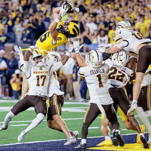 Michigan's wide receiver JJ Buchanan (6) makes the game-winning catch to win over Western Michigan with a last-second touchdown during an NCAA college football game in Ann Arbor, Mich., Saturday, Sept. 5 2026. (Jacob Hamilton/Ann Arbor News via AP)