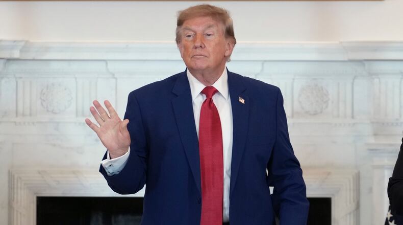 President Donald Trump departs after speaking at a roundtable on American mining, Friday, Aug. 7, 2026, at the State Department in Washington. (AP Photo/Allison Robbert)
