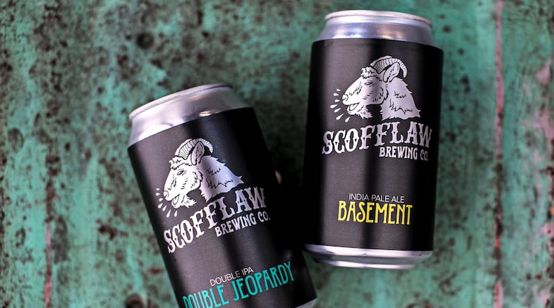 Just in time for the holidays, Atlanta’s Scofflaw Brewing Co. shipped its first cans of Basement IPA and Double Jeopardy Double IPA. CONTRIBUTED BY HEIDI GELDHAUSER