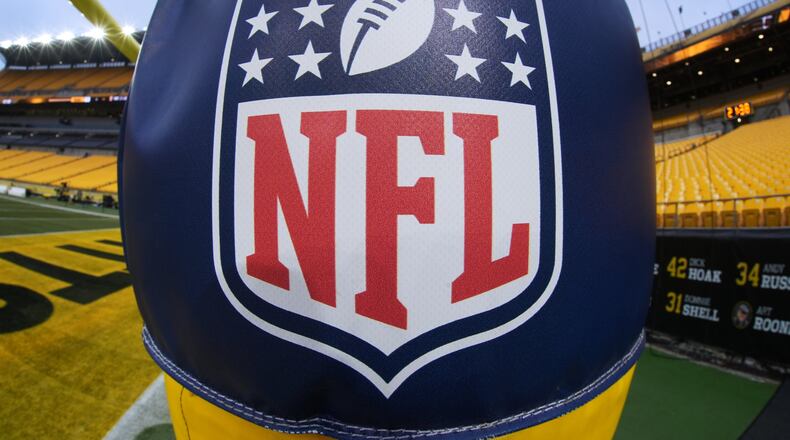 FILE - The NFL logo is displayed on a goal post at Acrisure Stadium before an NFL football game between the Pittsburgh Steelers and the Baltimore Ravens in Pittsburgh Jan. 4, 2026. (AP Photo/Gene J. Puskar, File)
