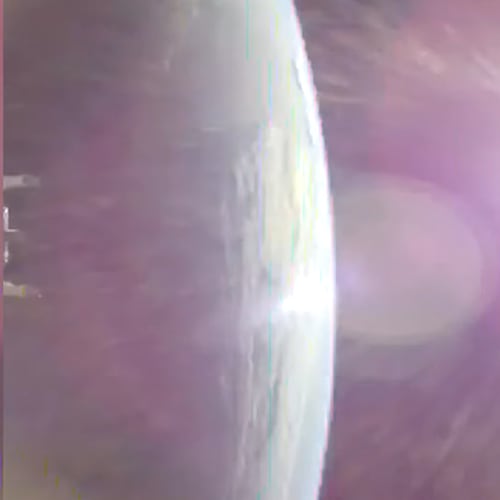 This image taken from video provided by NASA shows the Earth, left, from NASA's Orion spacecraft as it fired its engines heading toward the moon Thursday, April 2, 2026. (NASA via AP)