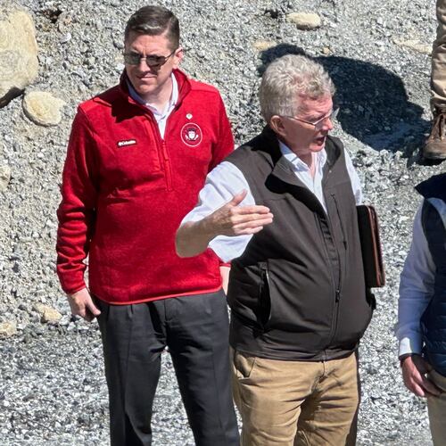 Homeland Security Secretary Markwayne Mullin, right, talks with Mayor Peter O'Leary, during a trip to survey damage caused by Hurricane Helene, Tuesday, April 7, 2026 in Chimney Rock, N.C. This is Mullin's first official trip since replacing Kristi Noem. (AP Photo Rebecca Santana)