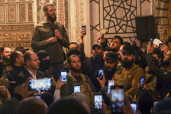 FILE - Abu Mohammed al-Golani speaks at the Umayyad Mosque in Damascus after toppling Bashar Assad's government on Dec. 8, 2024. (AP Photo/Omar Albam)