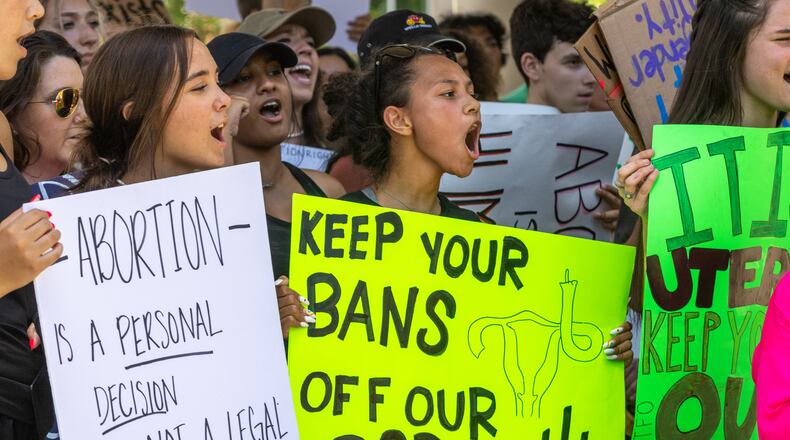 Protesters participating in a student-led, nonpartisan demonstration supporting reproductive freedoms listen to the speakers at  Alpharetta City Hall on Saturday, July 2, 2022. (Photo: Steve Schaefer / steve.schaefer@ajc.com)