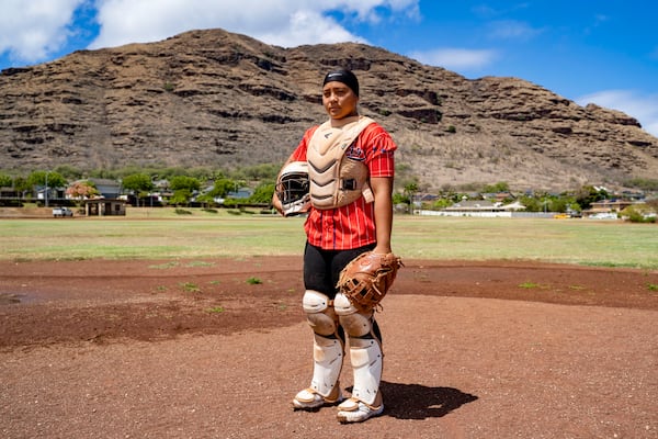 Ry-n Uyeda, 17, a senior at Waianae High School, poses for a portrait, Friday, July 11, 2025, in Waianae, Hawaii. (AP Photo/Mengshin Lin)