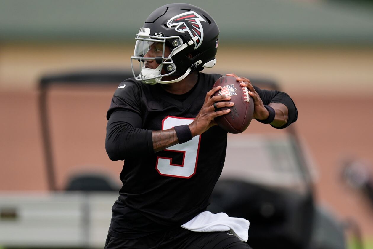 Falcons quarterback Michael Penix Jr. works out during practice on Wednesday, May 27, 2026, in Flowery Branch. Penix is seven months removed from suffering a torn ACL, and admitted Tuesday he still isn’t 100% healthy. (Mike Stewart/AP)