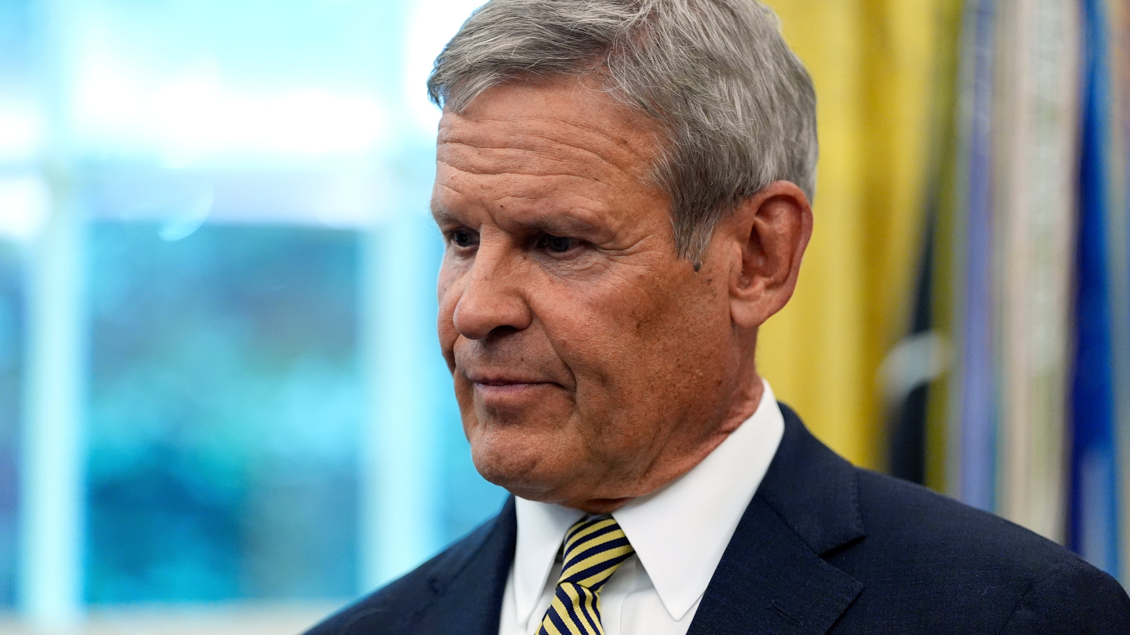 Tennessee Gov. Bill Lee listens as President Donald Trump speaks in the Oval Office of the White House, Monday, Sept. 15, 2025, in Washington. (AP Photo/Alex Brandon)