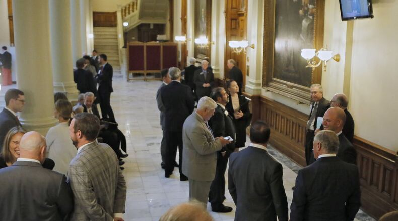 Lobbyists outside of a Gold Dome House Appropriations Committee meeting in Nov. 2018 during a special session of the Georgia Legislature. BOB ANDRES / BANDRES@AJC.COM
