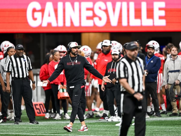 Gainesville head coach Josh Niblett reacts to a referees call against the Red Elephants during the second half of a Class 5A championship game Wednesday, Dec. 17, 2025 at the Mercedes-Benz Stadium. (Daniel Varnado/For the AJC)