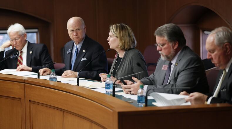 2/15/18 - Atlanta - Rep. Jan Jones (center), R - Milton, the lone woman on the committee, recommends the adoption of the new policy to the Legislative Services Committee. Georgia legislators will be required to get training every other year on sexual harassment, according to a new policy passed by a committee vote Thursday. But harassment complaints would remain confidential, BOB ANDRES /BANDRES@AJC.COM