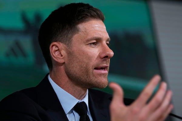 Former footballer Xavi Alonso speaks to reporters during his presentation as Real Madrid's new coach at the Club's headquarters in Madrid on Monday 26 May 2025. (AP Photo/Jose Breton)