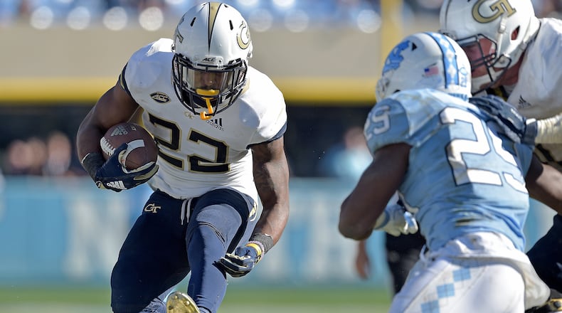 CHAPEL HILL, NC - NOVEMBER 03: Clinton Lynch #22 of the Georgia Tech Yellow Jackets runs for a first down against the North Carolina Tar Heels during the fourth quarter of their game at Kenan Stadium on November 3, 2018 in Chapel Hill, North Carolina. Georgia Tech won 38-28. (Photo by Grant Halverson/Getty Images)