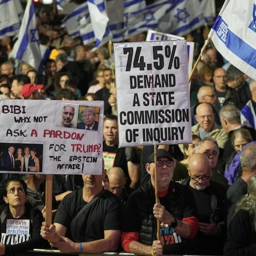 People take part in a protest against Prime Minister Benjamin Netanyahu's government and call for a state commission of inquiry to investigate the events of the Hamas militant group attack of October 7, 2023, as they gather at Habima square, in Tel Aviv, Israel, Saturday, Nov. 15, 2025. (AP Photo/Mahmoud Illean)