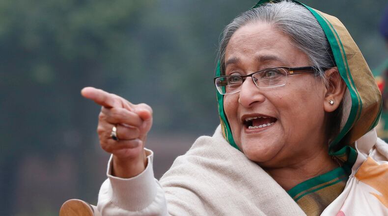 FILE- Bangladesh's Prime Minister Sheikh Hasina speaks during a press conference in Dhaka, Bangladesh, on Jan. 6, 2014. (AP Photo/Rajesh Kumar Singh, File)