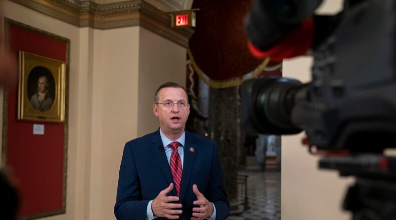 Rep. Doug Collins, R-Georgia, the top Republican on the House Judiciary Committee, does a tv news interview just outside the House chamber, Friday, Jan. 10, 2020, at the Capitol in Washington. Speaker of the House Nancy Pelosi, D-Calif., has not yet relayed the articles of impeachment to the Senate for trial three weeks since President Donald Trump was impeached on charges of abuse and obstruction. (AP Photo/J. Scott Applewhite)