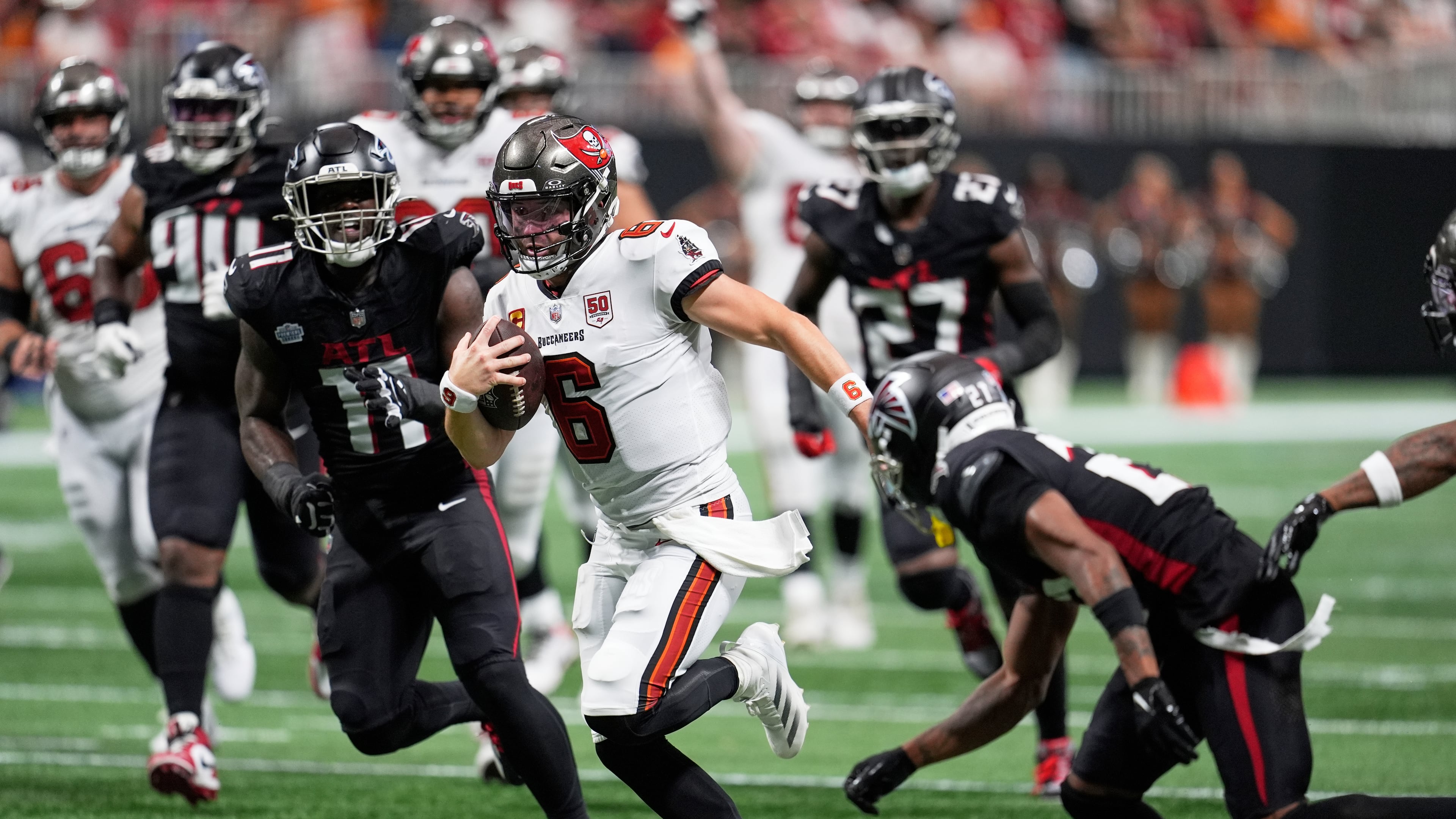 Tampa Bay Buccaneers quarterback Baker Mayfield runs the ball during the second half of an NFL football game against the Atlanta Falcons, Sunday, Sept. 7, 2025, in Atlanta. (Mike Stewart/AP)