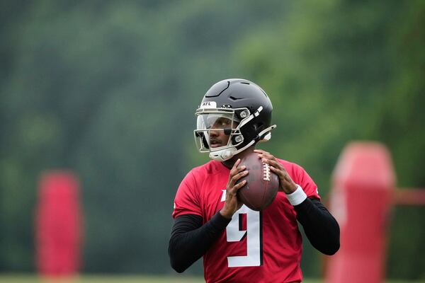 Atlanta Falcons quarterback Michael Penix Jr. (9) runs drills during an NFL football training camp practice on Tuesday, May 27, 2025, in Flowery Branch, Ga. (AP Photo/Brynn Anderson)