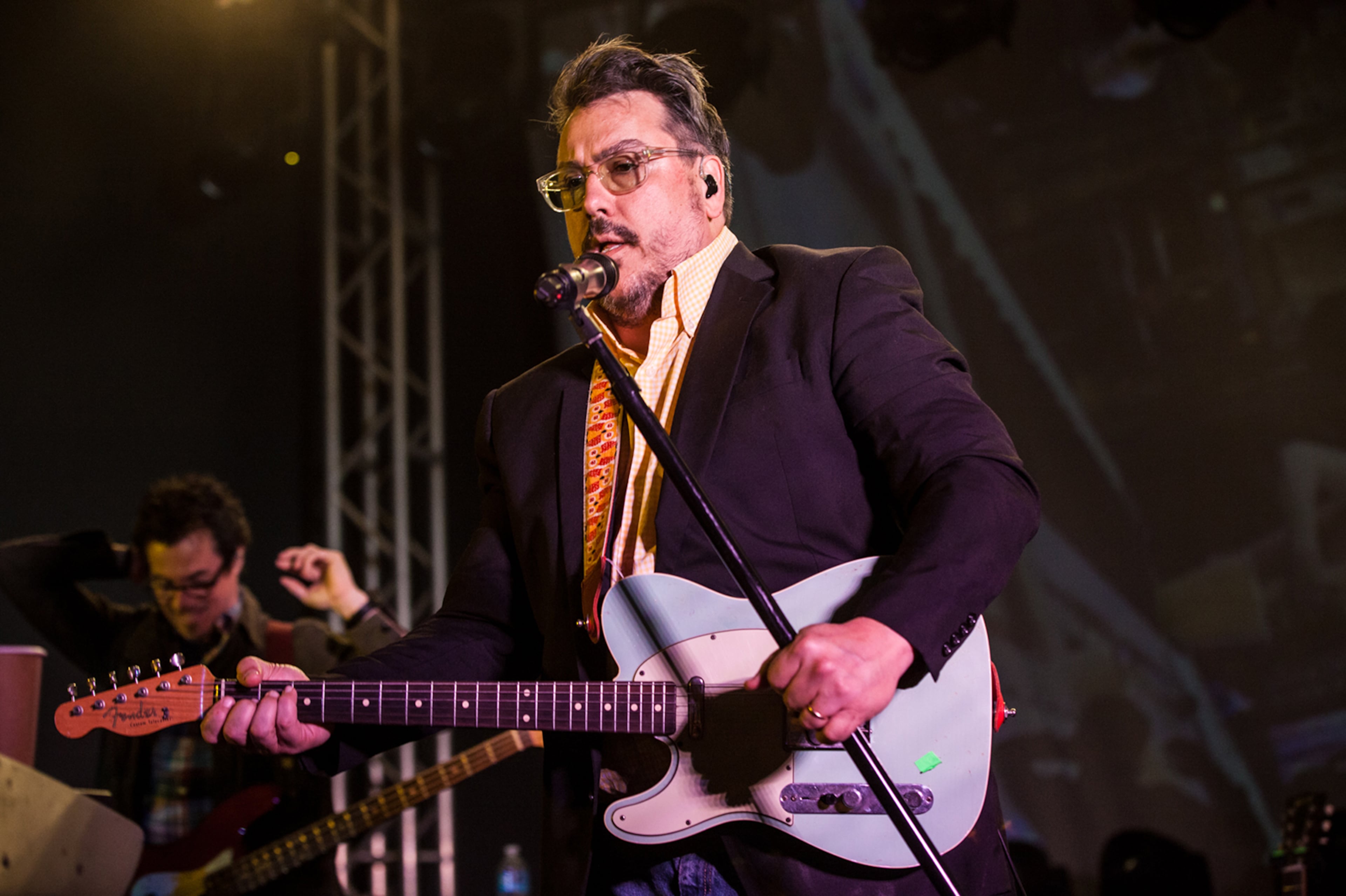 John Flansburgh of They Might Be Giants — pictured performing in Texas in 2016 — called living across from an Atlanta strip club at age 20 in 1980 a "very colorful interval in my life." (Michael Mullenix/TNS 2016)