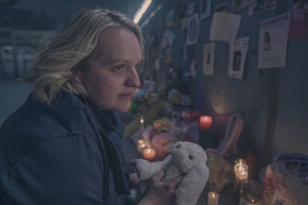 This image released by Hulu shows Elisabeth Moss in a scene from "The Handmaid's Tale." (Steve Wilkie/Disney via AP)