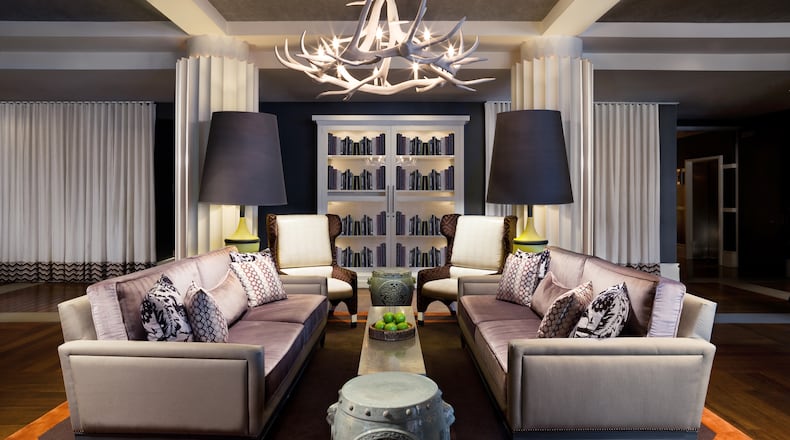 The living room of the W Atlanta-Buckhead hotel on Peachtree Road in Atlanta. The hotel recently sold to Woodbine Legacy Investments and fund’s parent company plans an extensive renovation. SPECIAL