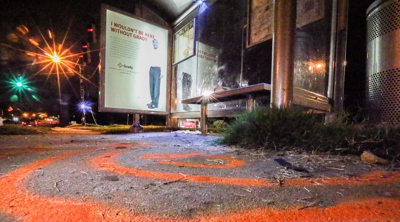 A man was killed early Monday while waiting at bus stop on Old National Highway in south Fulton County, according to police. JOHN SPINK / JSPINK@AJC.COM