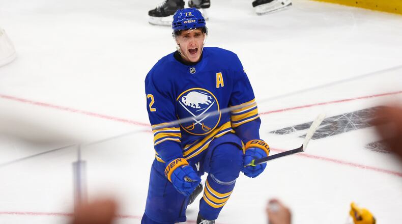 Buffalo Sabres center Tage Thompson (72) celebrates his goal during the third period in Game 1 of a first-round NHL hockey Stanley Cup playoff series against the Boston Bruins, Sunday, April 19, 2026, in Buffalo, N.Y. (AP Photo/Jeffrey T. Barnes)