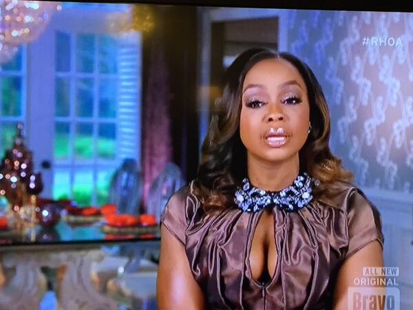 Phaedra Parks takes her two young sons to see their father Apollo Nida in prison. CREDIT: Bravo