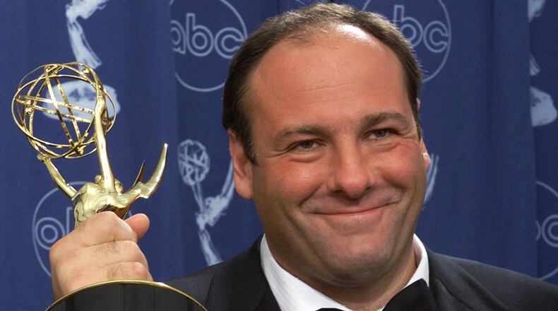In this Sept. 10, 2000 file photo, actor James Gandolfini holds his award for outstanding lead in a drama series for his work in "The Sopranos" at the 52nd Annual Primetime Emmy Awards in Los Angeles. Gandolfini died Wednesday, June 19, 2013, in Italy. He was 51. (AP Photo/Kevork Djansezian, File)