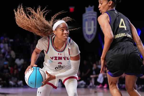 Vinyl guard Jordin Canada makes her move around Lunar Owls guard Skylar Diggins-Smith in their Unrivaled 3-on-3 basketball semifinal, Sunday, March 16, 2025, in Medley, Fla. (AP Photo/Rebecca Blackwell)