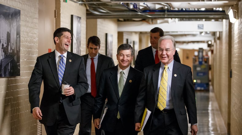 Speaker Paul Ryan, left, Georgia Republican Tom Price, right, and other Republicans walk through a basement corridor in the U.S. Capitol in 2015. (AP Photo/J. Scott Applewhite)