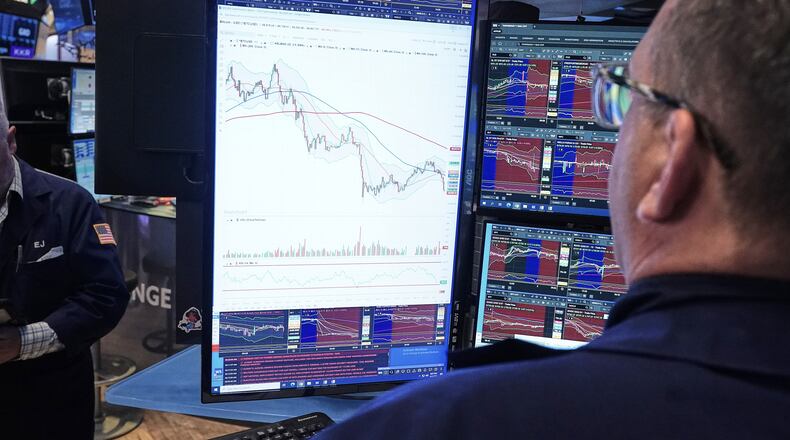 Specialist Anthony Matesic works at his post on the floor of the New York Stock Exchange, Wednesday, June 3, 2026. (AP Photo/Richard Drew)