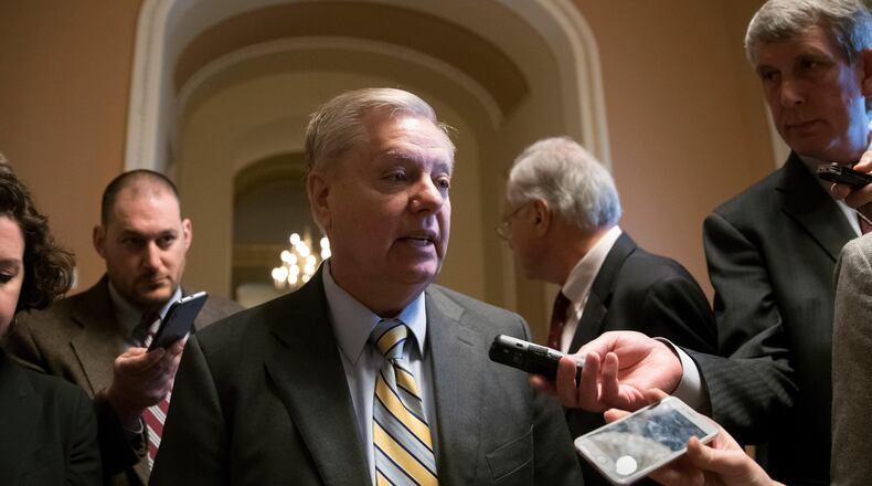 Sen. Lindsey Graham, R-S.C., talks to reporters at the Capitol in Washington, Wednesday, Feb. 7, 2018. Senate Judiciary Committee Chairman Charles Grassley of Iowa and Graham released a criminal referral they had sent to the Justice Department earlier this year asking for an investigation into the former spy, Christopher Steele. The senators say theyâve found evidence that either Steele lied to the FBI or classified documents supporting the surveillance contain false statements. (AP Photo/J. Scott Applewhite)