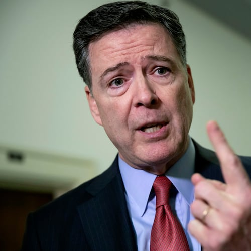FILE - Former FBI Director James Comey speaks to reporters on Capitol Hill Washington, Dec. 17, 2018. AP Photo/J. Scott Applewhite, File)