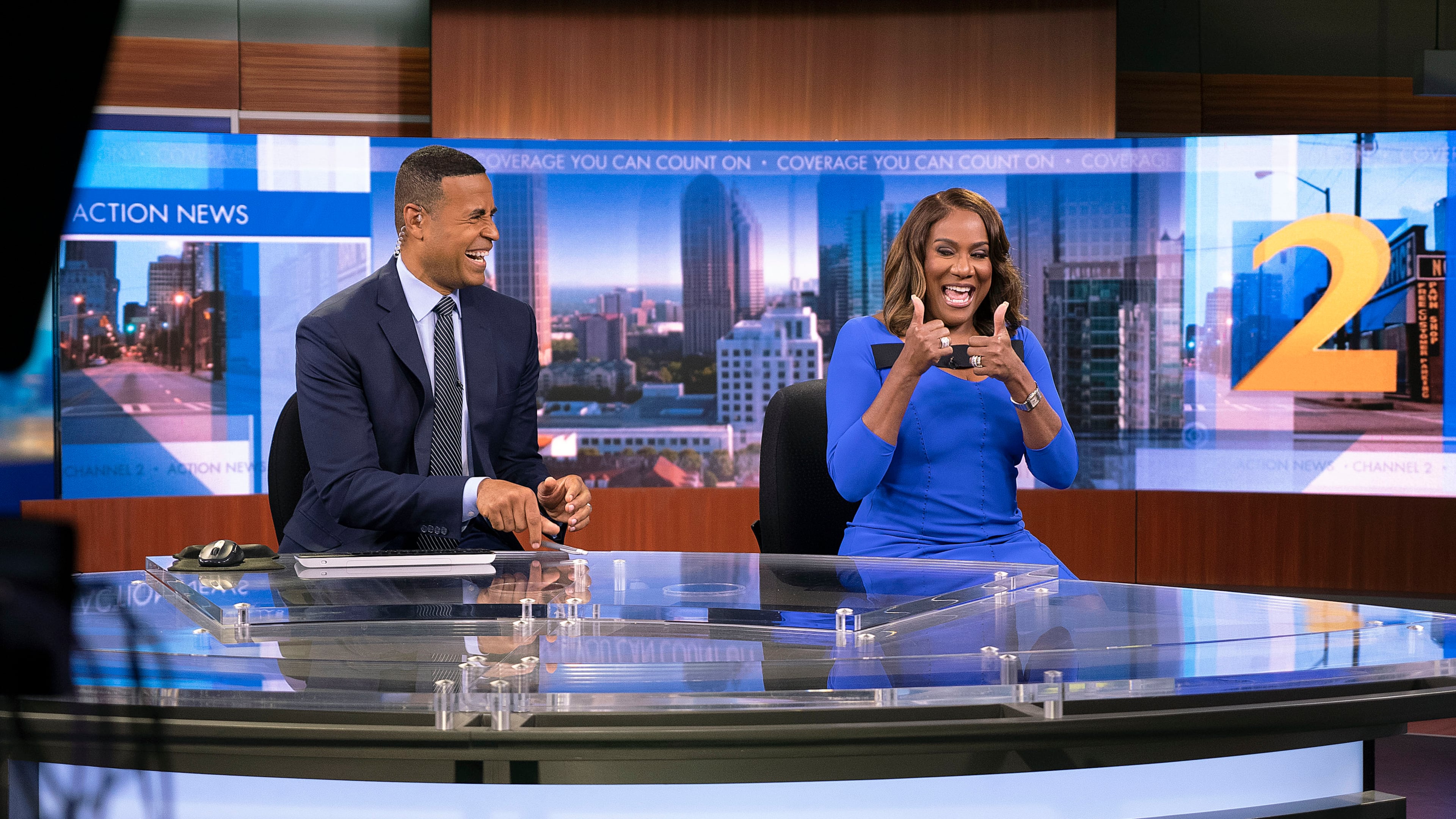 September 6, 2022 Atlanta - News anchors Fred Blankenship and Karyn Greer wrap up a fun moment in the WSB-TV studio, after Blankenship introduces Greer as the new addition to the Channel 2 Action News team. (Ryon Horne/AJC)