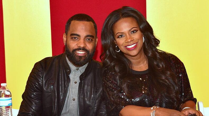 Todd Tucker and Kandi Burruss of ‘Real Housewives of Atlanta’ fame attend the Tour of Kandi Koated Studio at Kandi Koated Entertainment Studios on November 19, 2015 in Atlanta, Georgia.