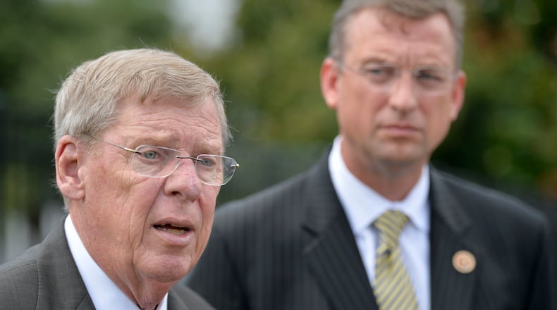 U.S. Senator Johnny Isakson, R-Ga., left, and Rep. Doug Collins, R-Ga., hold a press conference outside the Charlie Norwood VA Medical Center in Augusta, Ga., Tuesday, Aug. 19, 2014. Isakson is a member of the Senate Veterans Affairs Committee and was in Augusta to meet with local VA officials and hosted a town hall meeting with local veterans. (AP Photo/The Augusta Chronicle, Michael Holahan) U.S. Senator Johnny Isakson, R-Ga., left, and U.S. Rep. Doug Collins, R-Ga., at a press conference last year in Augusta. (AP/Augusta Chronicle, Michael Holahan).