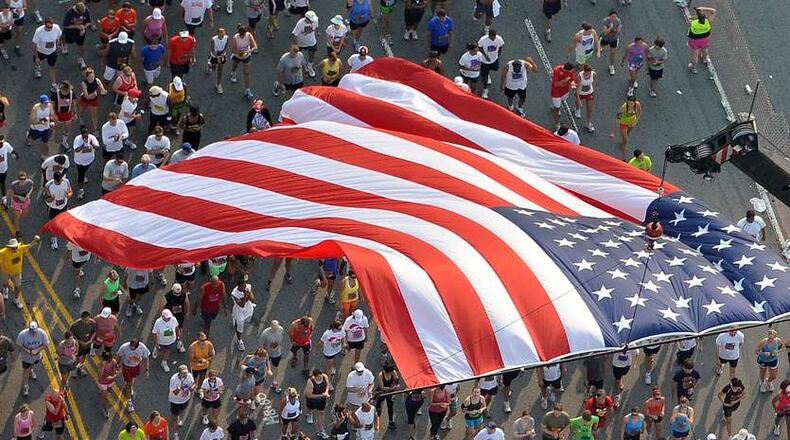 110704 Atlanta: Start line of the AJC Peachtree Road Race Monday July 4, 2011. More than$110,000 in prize was up for grabs in the 42nd running of the AJC Peachtree Road Race Monday July 4, 2011. More than 60,000 took part in the race. Brant Sanderlin bsanderlin@ajc.com