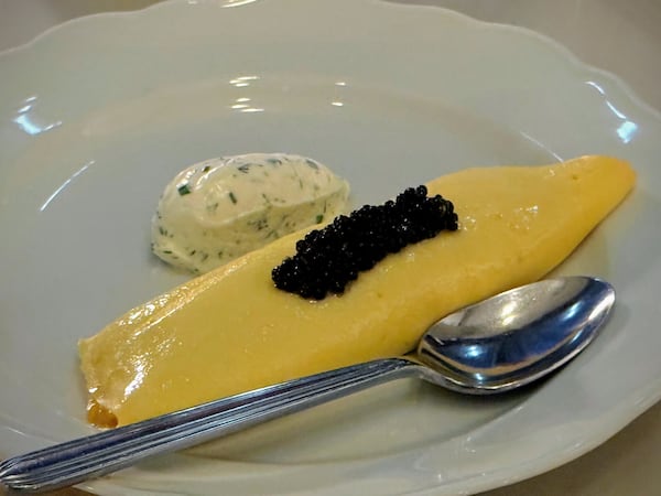 At Lucian Books & Wine, you can get a classic omelet topped with caviar. (Henri Hollis/AJC)